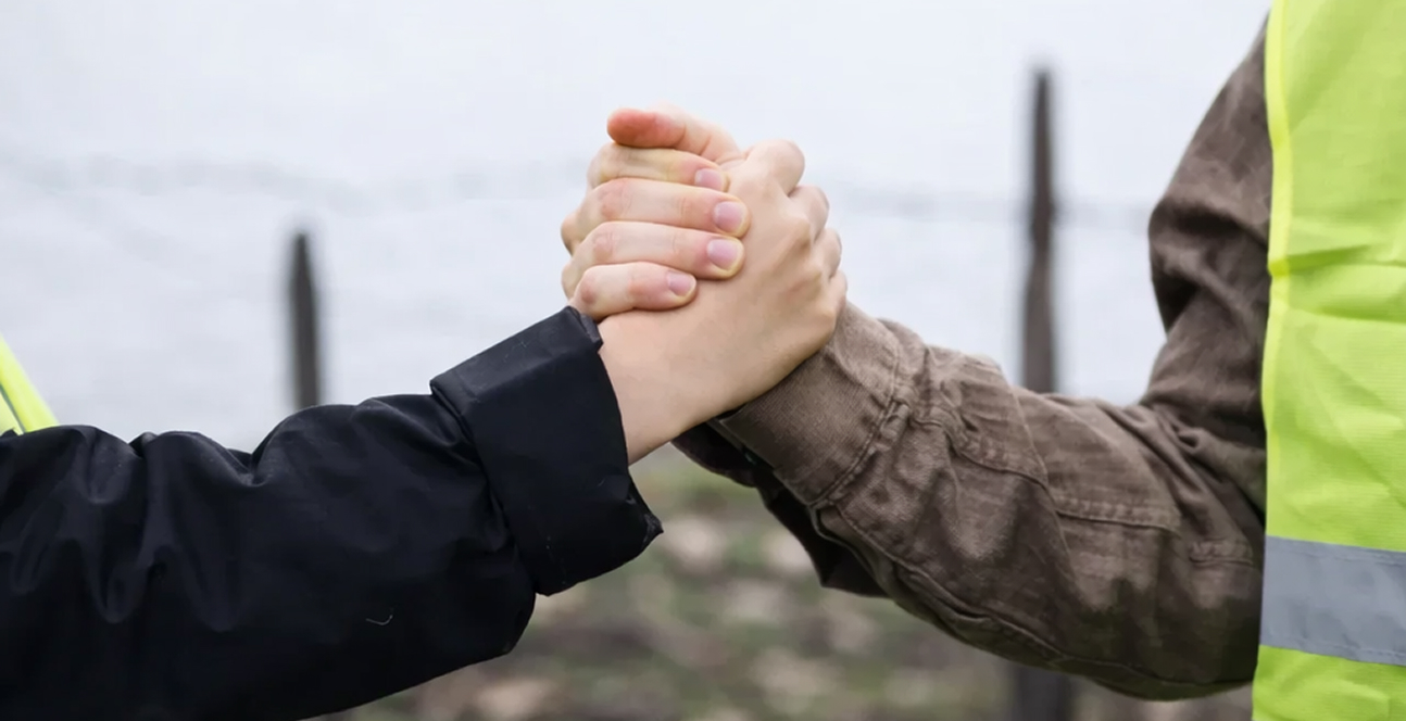 team cooperation handshake